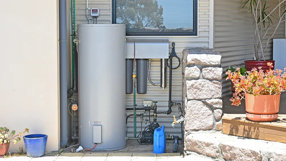 photo of water heater set up outside of a home