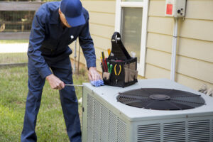 HVAC technician repairing ac 